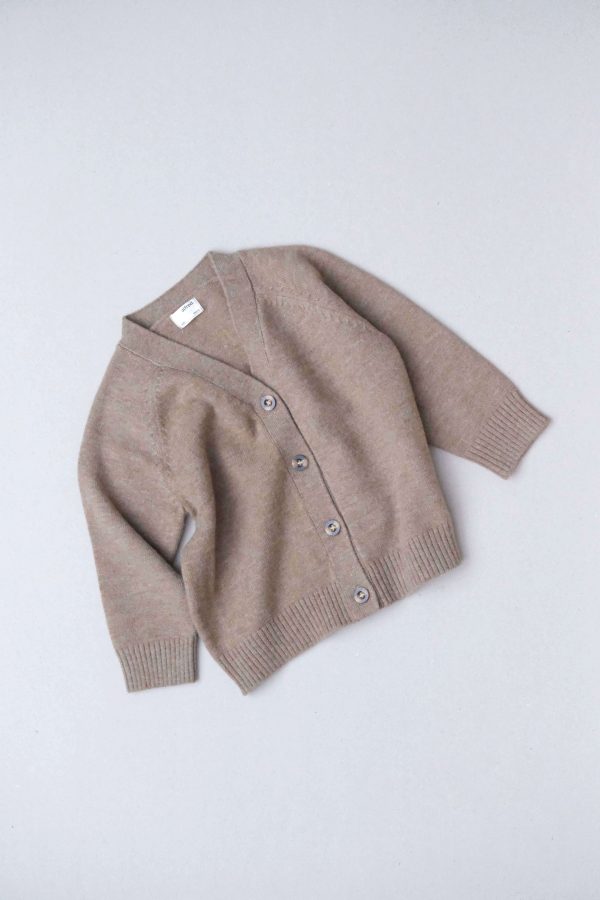 flatlay of the Dorothy Cardigan in Khaki by the brand Alfred