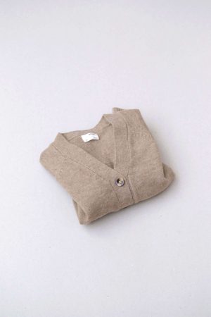 flatlay of the Dorothy Cardigan in Khaki by the brand Alfred