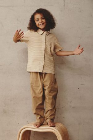 girl wearing the Duncan Pants in Khaki by the brand Alfred