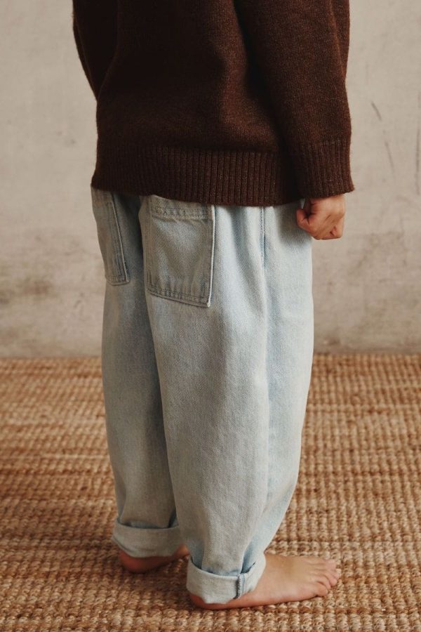 the Franklin Jeans in Blue Denim paired with the Bruno Jumper by the brand Alfred