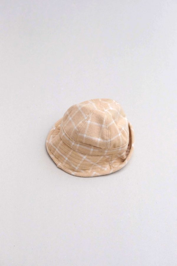 flatlay of the Joan Check Bucket Hat in beige by the brand Alfred