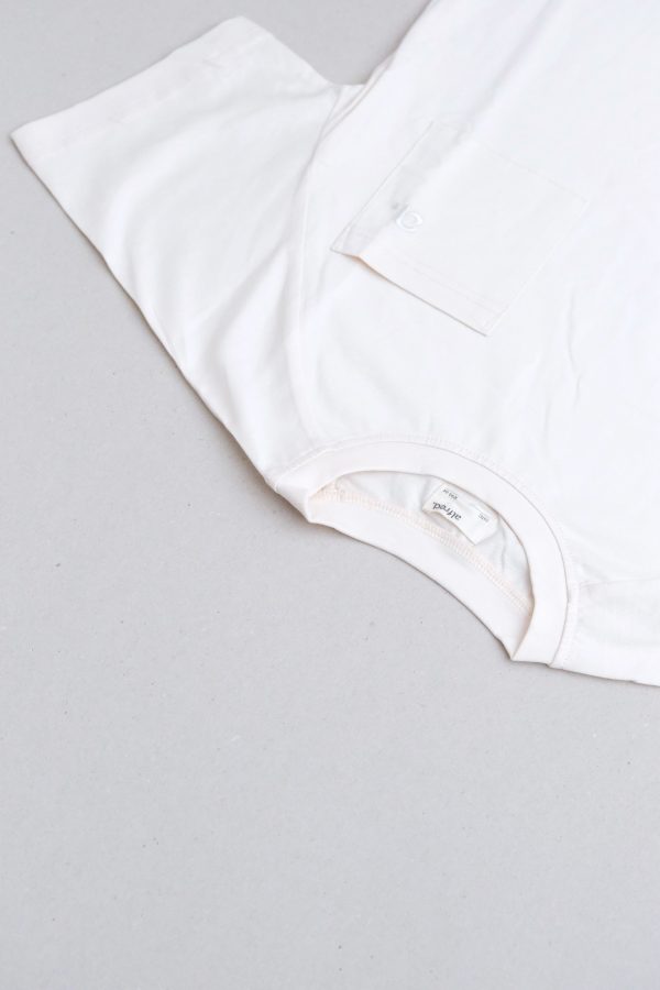 flatlay of the Walter Tee in Cream by the brand Alfred