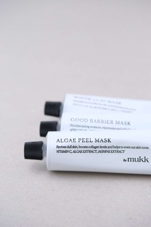 three variations of masks by By Mukk, with a focus on the Algae Peel Mask that shows the ingredients on the front of the product