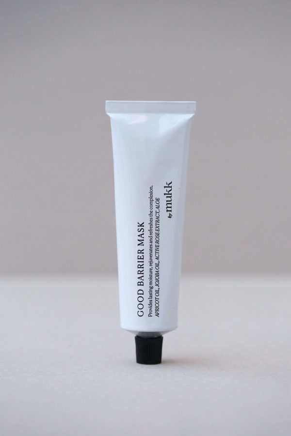 front view of the Good Barrier Mask by By Mukk showing the aesthetically pleasing product design with the ingredients listed on the front of the product