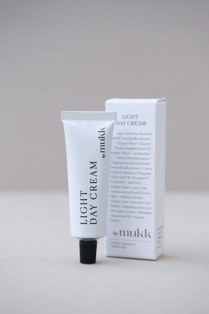 front view of the Light Day Cream of By Mukk, showing the product out of the box with main ingredients listed in front