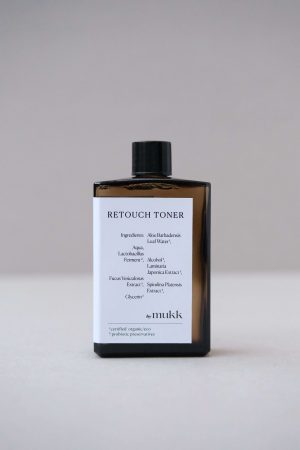 front view of the Retouch Toner of By Mukk, showing the aesthetically pleasing product design with the ingredients listed on the front of the product