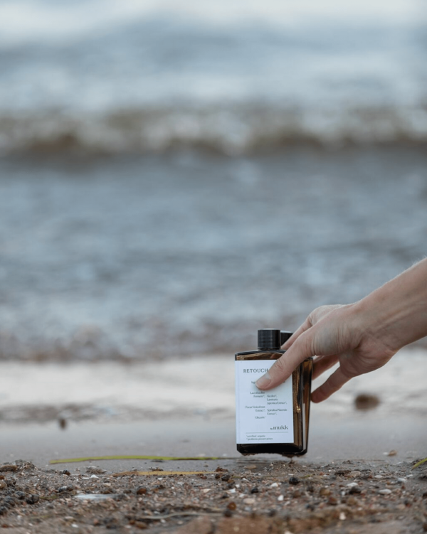 Someone placing the Retouch Toner on a beach, showing the designers' biggest inspiration