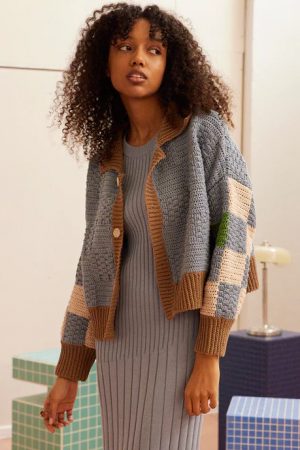 woman wearing the cotton Prietema Crochet Jacket in Fantasy Blue by the sustainable brand The Knotty Ones, curated by Morsel Store