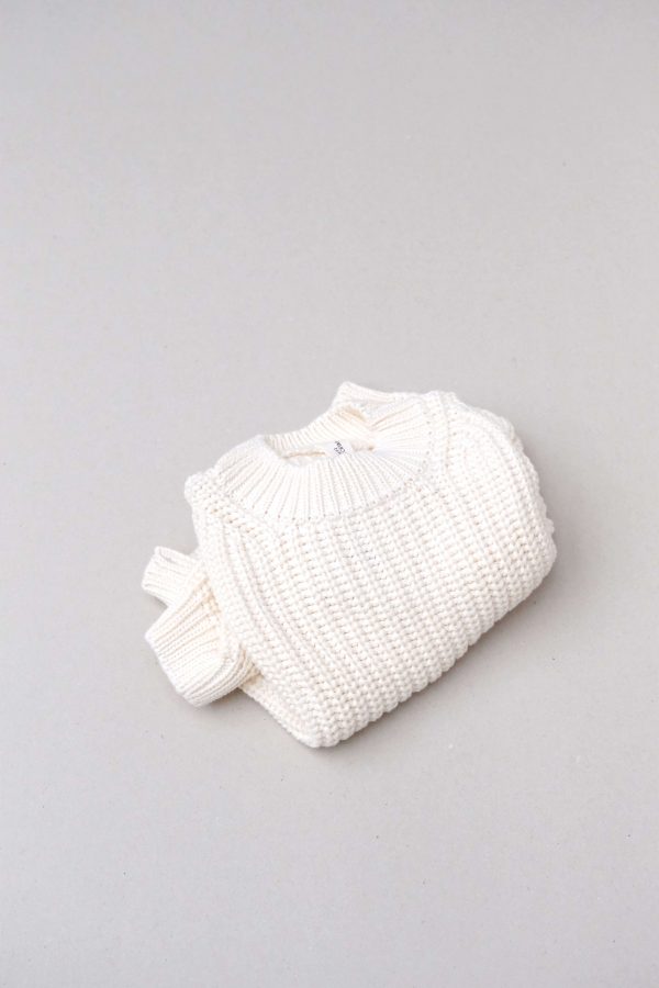 flatlay of the chunky pullover in cream by the brand Summer and Storm