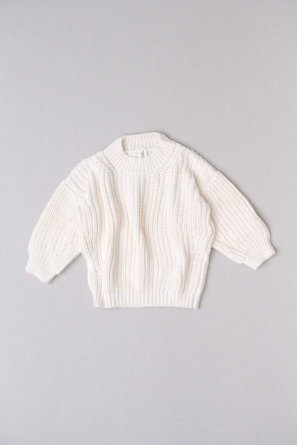 flatlay of the chunky pullover in cream by the brand Summer and Storm