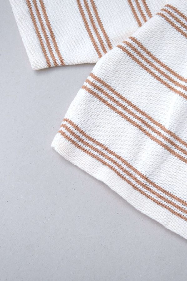flatlay of the Knitted Pullover in Caramel Stripe by the brand Summer and Storm