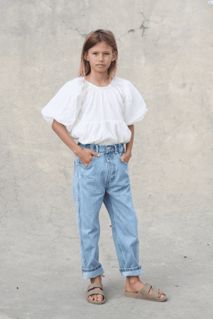 the 80s denim jean in lightwash by the brand Summer and Storm