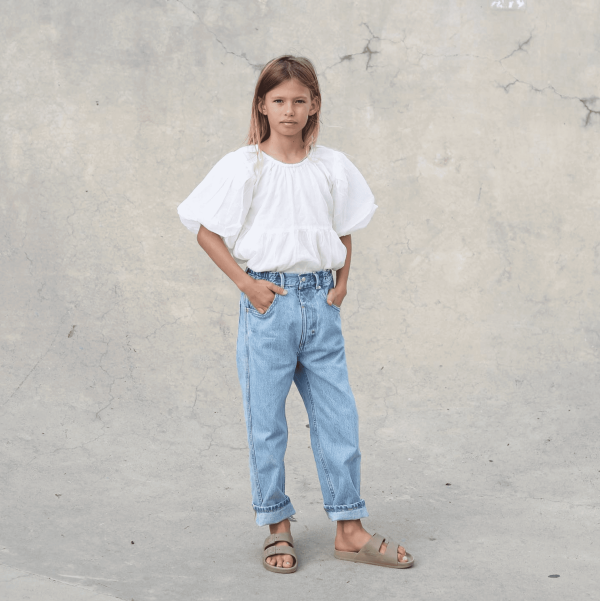 the 80s denim jean in lightwash by the brand Summer and Storm