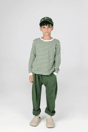 the waffle slouch pants in forest green by the brand Summer & Storm