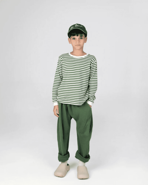 the waffle slouch pants in forest green by the brand Summer & Storm