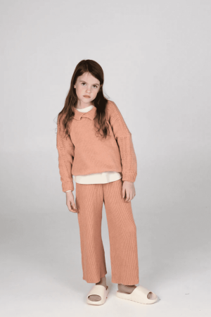 the wide knit pants & collared knit in coral by the brand Summer and Storm