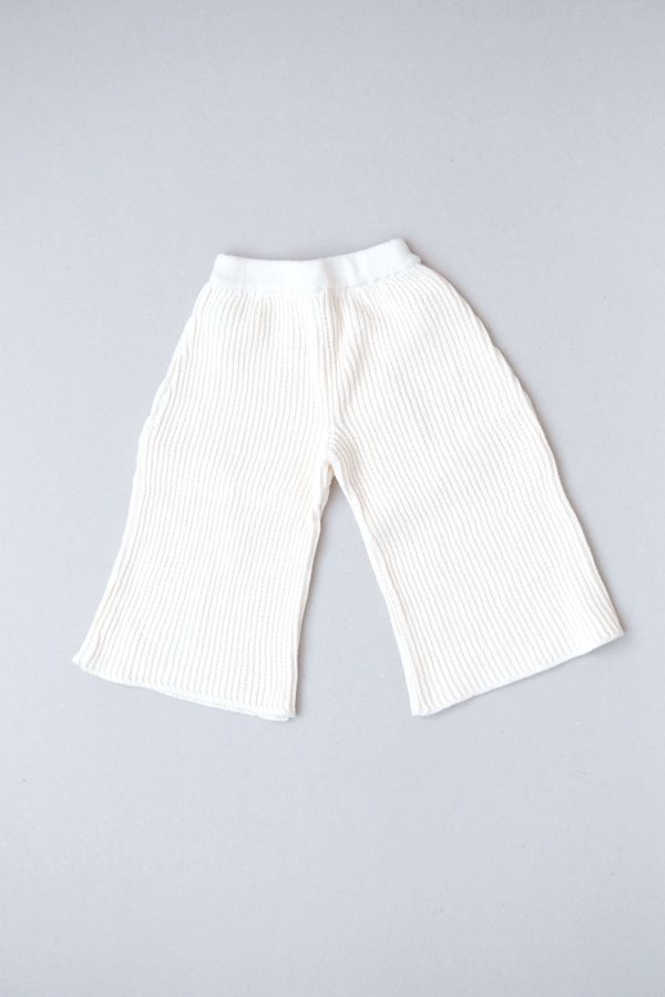 the wide knit pants in ivory by the brand Summer and Storm
