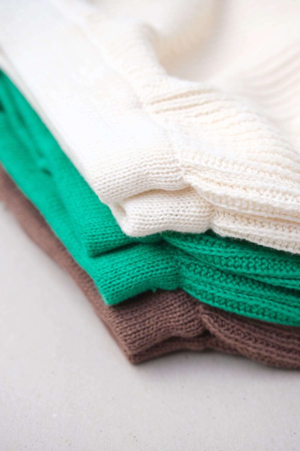 flatlay of the Wide Knit Pants in Coco, Emerald and Natural by the brand Summer and Storm