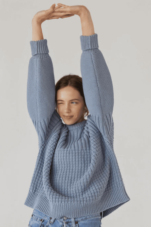 the Delcia Sweater in Blue by the brand The Knotty Ones