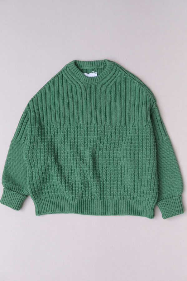 the Delcia Sweater in Fern Green by the brand The Knotty Ones