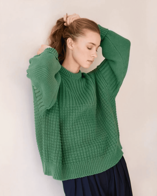 the Delcia Sweater in Fern Green by the brand The Knotty Ones