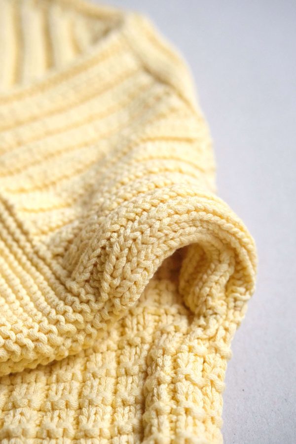 the Delcia Sweater in Lemon by the brand The Knotty Ones