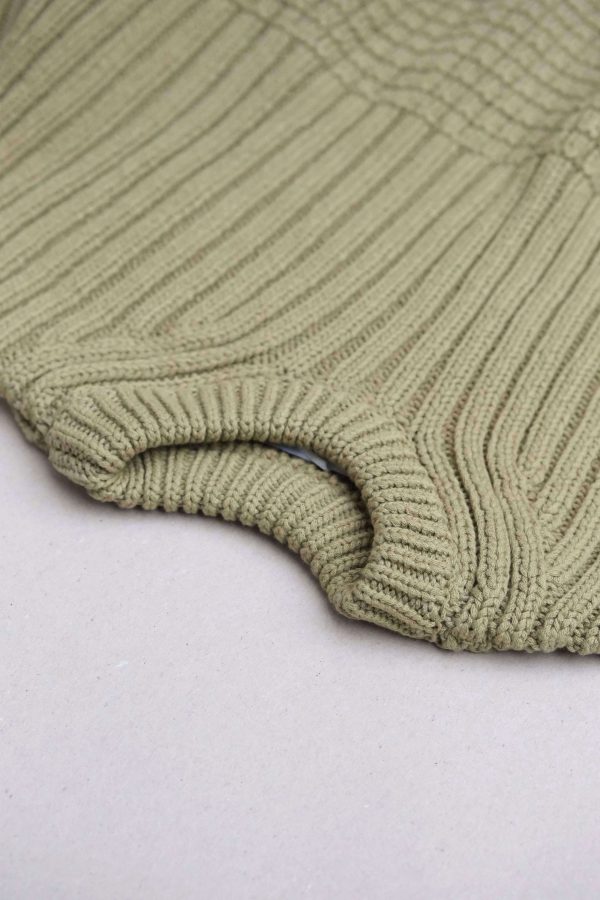 the Delcia Sweater in Olive by the brand The Knotty Ones