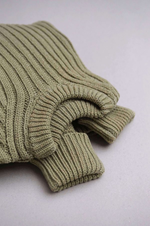 the Delcia Sweater in Olive by the brand The Knotty Ones