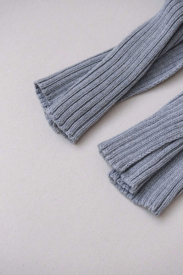 the knitted Rib Scarf in Grey by the brand The Knotty Ones