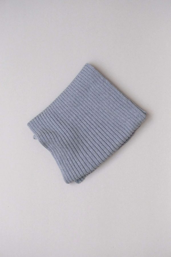 the knitted Rib Scarf in Grey by the brand The Knotty Ones