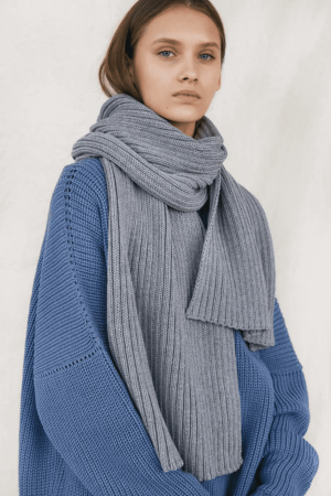 the knitted Rib Scarf in Grey by the brand The Knotty Ones