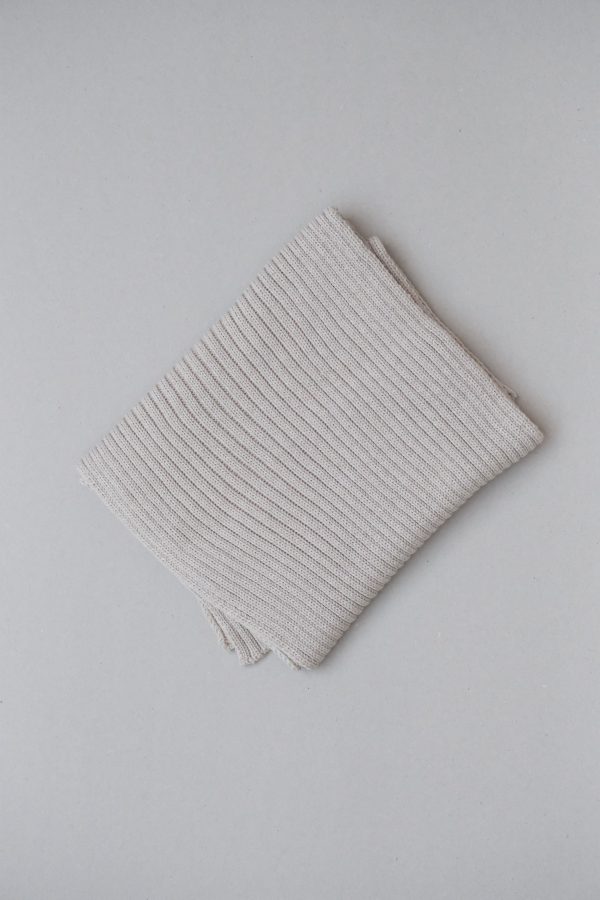 the knitted Rib Scarf in Pearl by the brand The Knotty Ones