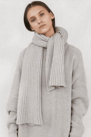 the knitted Rib Scarf in Pearl by the brand The Knotty Ones