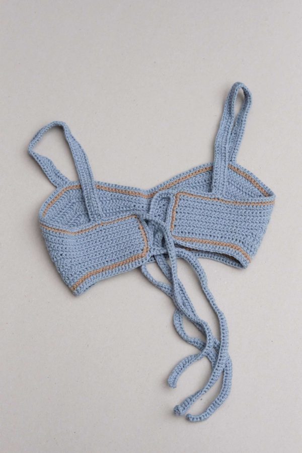 the knitted Zemelapis Bralette in Sea by the brand The Knotty Ones