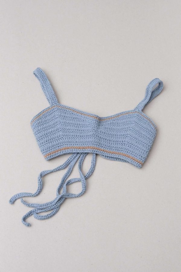 the knitted Zemelapis Bralette in Sea by the brand The Knotty Ones