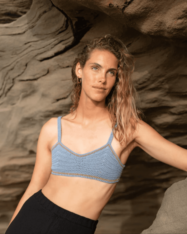 the knitted Zemelapis Bralette in Sea by the brand The Knotty Ones