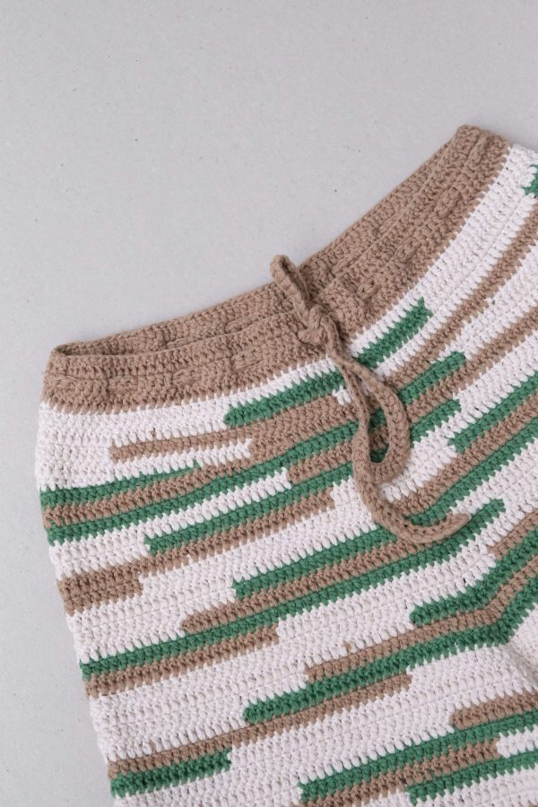 the knitted Zemelapis Shorts in Land by the brand The Knotty Ones