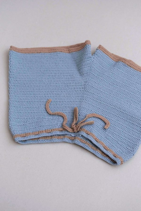 the knit Zemelapis Shorts in Sea by the brand The Knotty Ones