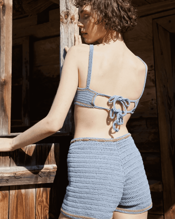 the knit Zemelapis Shorts in Sea paired with the Zemelapis Bralette by the brand The Knotty Ones