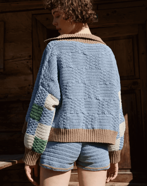 the knit Zemelapis Shorts in Sea paired with the Prietema Cardigan by the brand The Knotty Ones