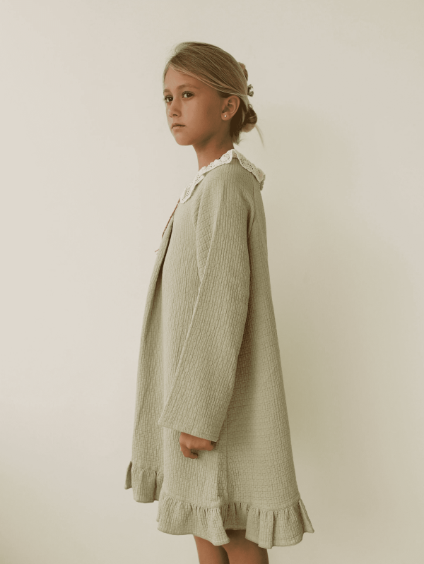 the aafia dress in dried herb by the brand Yoli and Otis