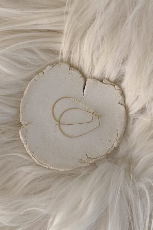 Example of how you can style and use the ceramic Moon Tray Love by Marlies Huybs for storing jewelry