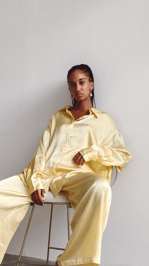 the silk Jai Button Up & Jai Pants in Yellow by the brand Bahhgoose