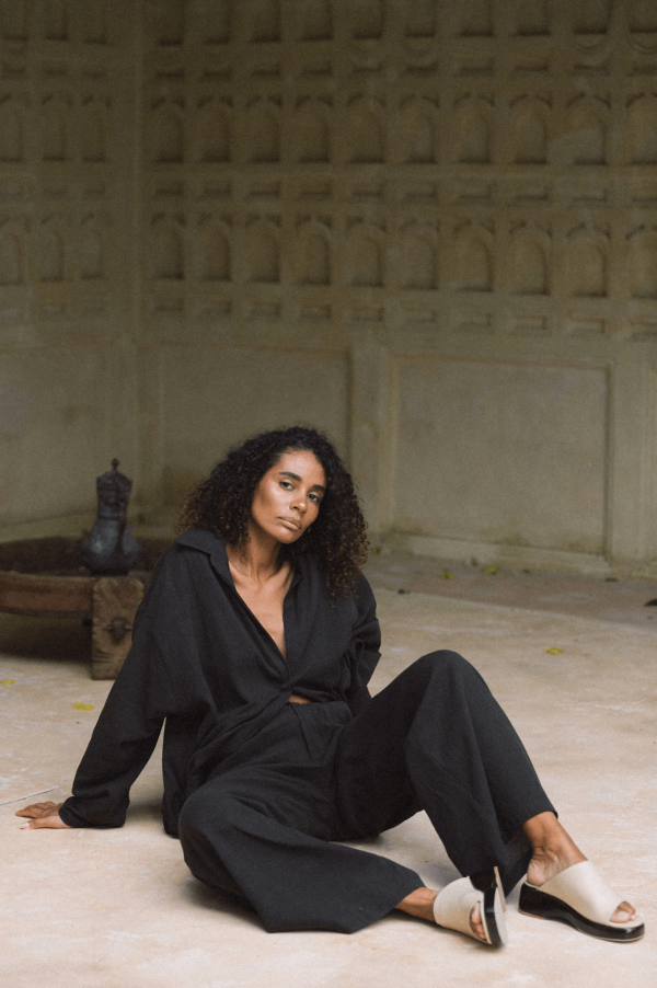 woman wearing the Ker Button Up in Charcoal with matching Ker Trousers by the brand Bahhgoose, showing the relaxed fit of this beautiful co-ord set