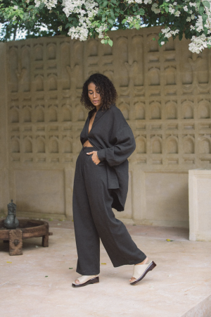 woman wearing the Ker Button Up in Charcoal with matching Ker Trousers by the brand Bahhgoose, showing the relaxed fit of this beautiful co-ord set