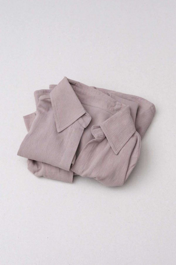 flatlay of the Ker Button Up in Taupe by the brand Bahhgoose