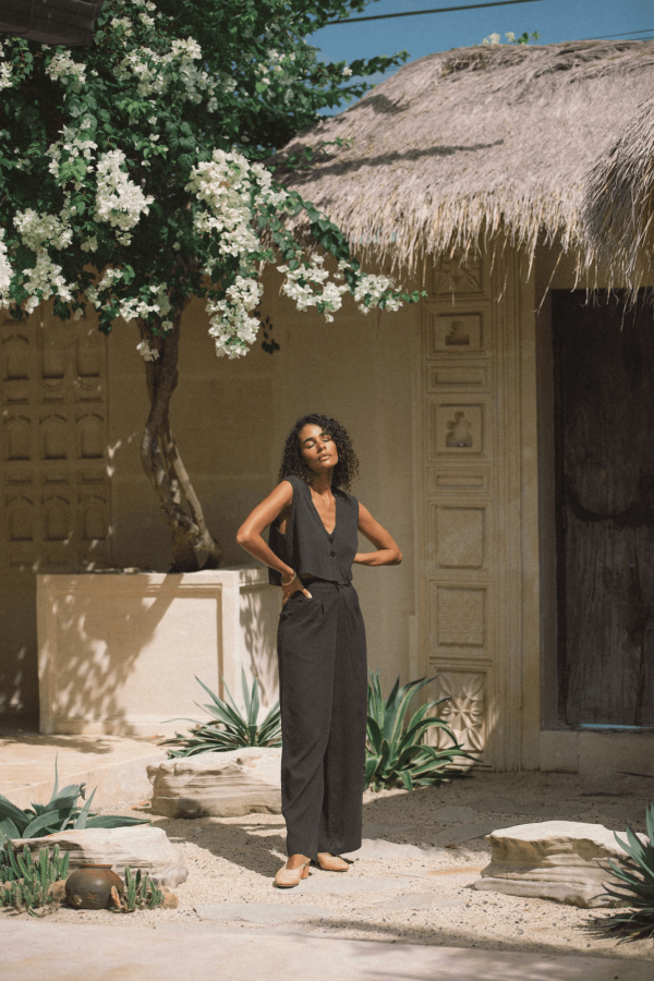 woman wearing the Ona Button Up in charcoal with the matching Ker Trouser by the brand Bahhgoose, showing the relaxed fit of this beautiful co-ord set