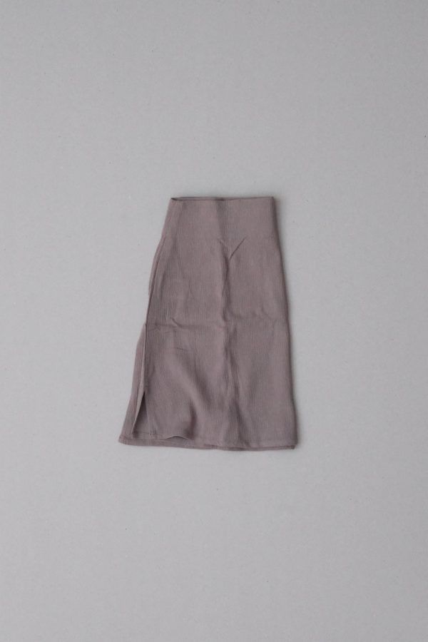 flatlay of the Ona Skirt in Taupe by the brand Bahhgoose