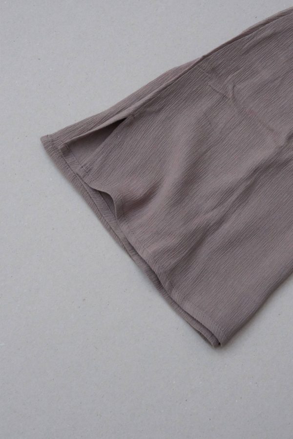 flatlay of the Ona Skirt in Taupe by the brand Bahhgoose