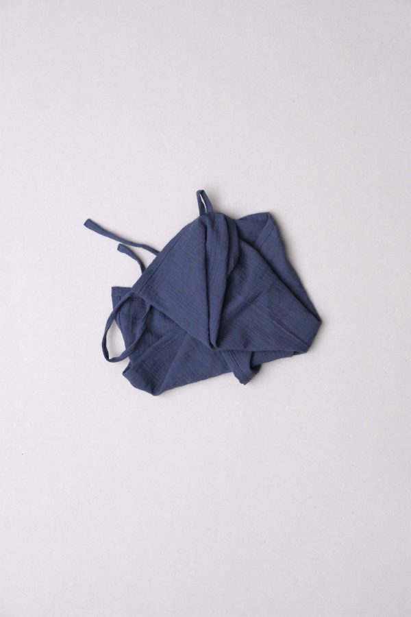 flatlay of the muslin gauze cotton dishtowel in Blue by the brand Cats and Boys